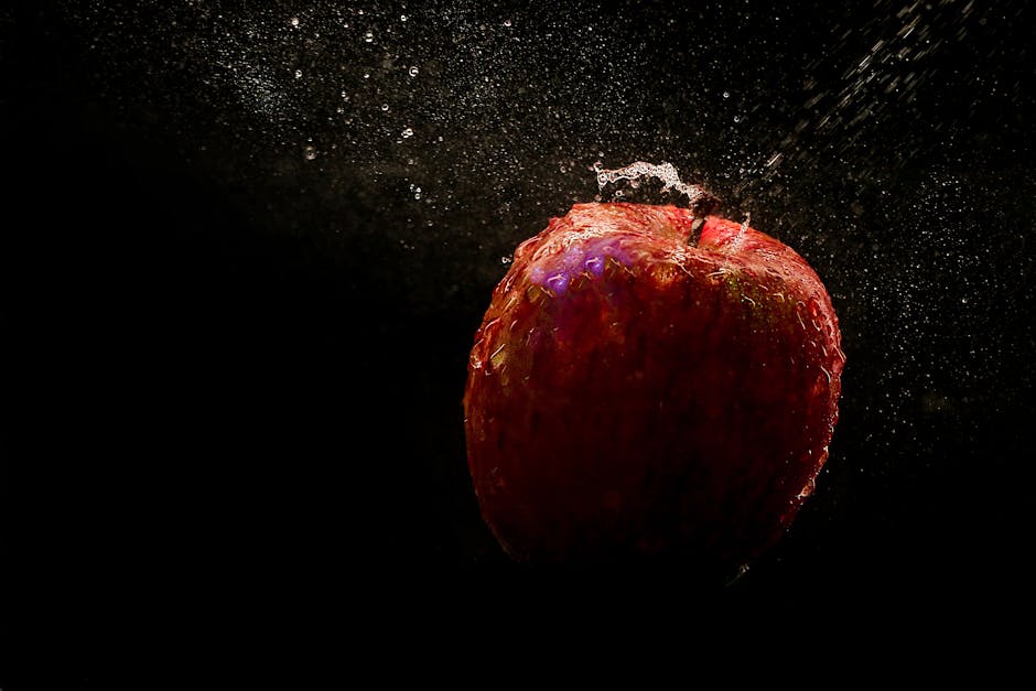 Fotografía De Lapso De Tiempo De La Caída De La Manzana Roja