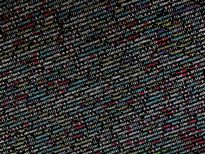 Vista en primer plano de código de programación colorido en una pantalla, ideal para temas de tecnología y desarrollo.