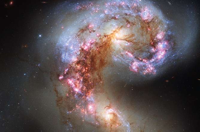 Hubble halla la galaxia más antigua que despejó el cosmos