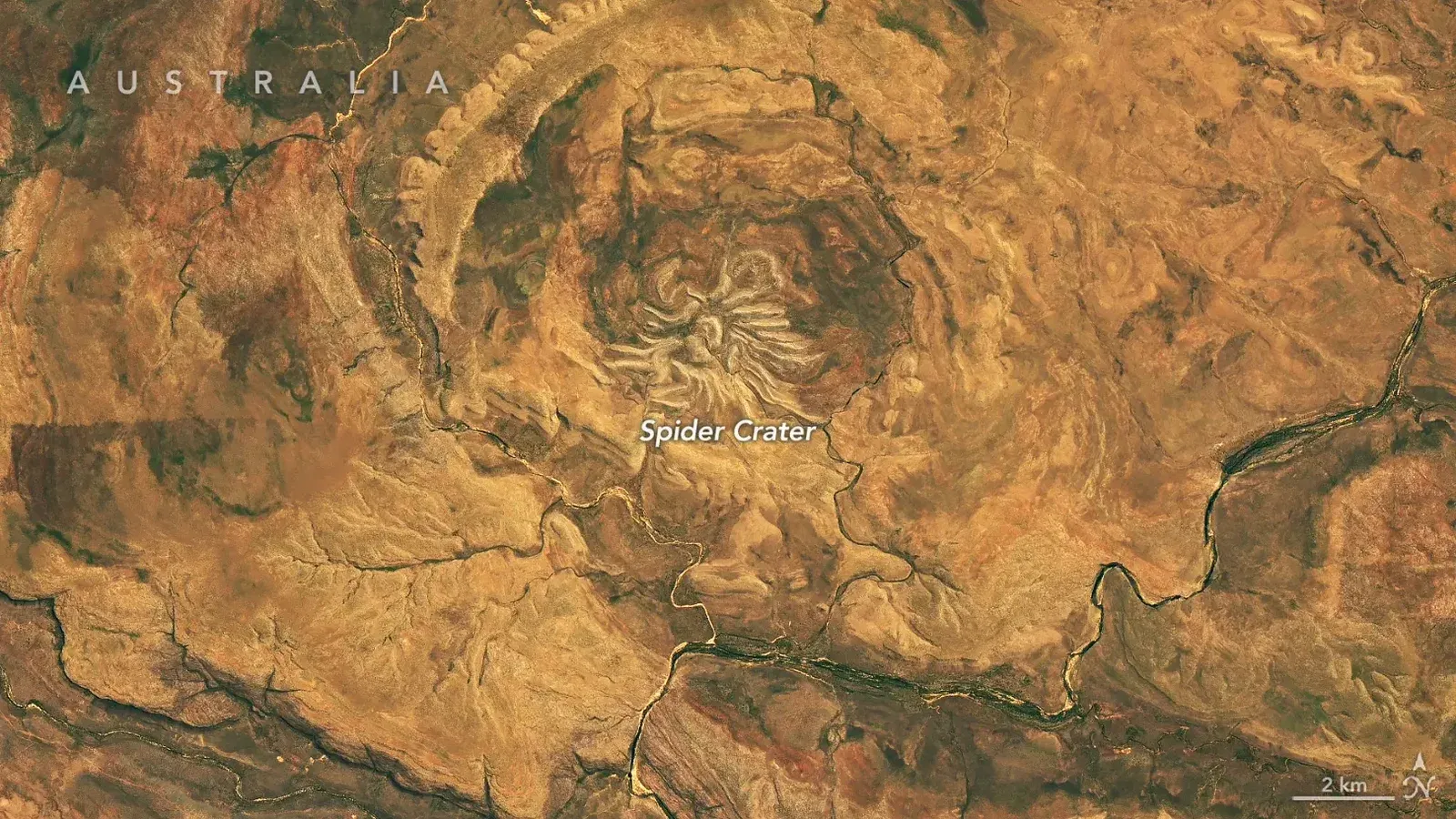 Landsat 9 muestra el cráter de Australia con forma de araña