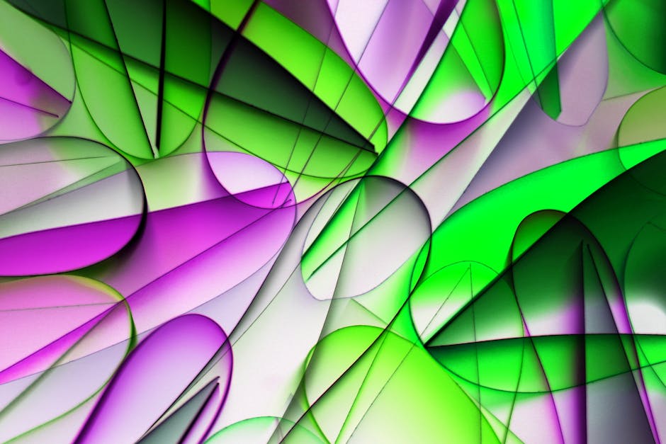 Imagen abstracta dinámica con degradados verdes y morados vibrantes que crean un diseño fluido.