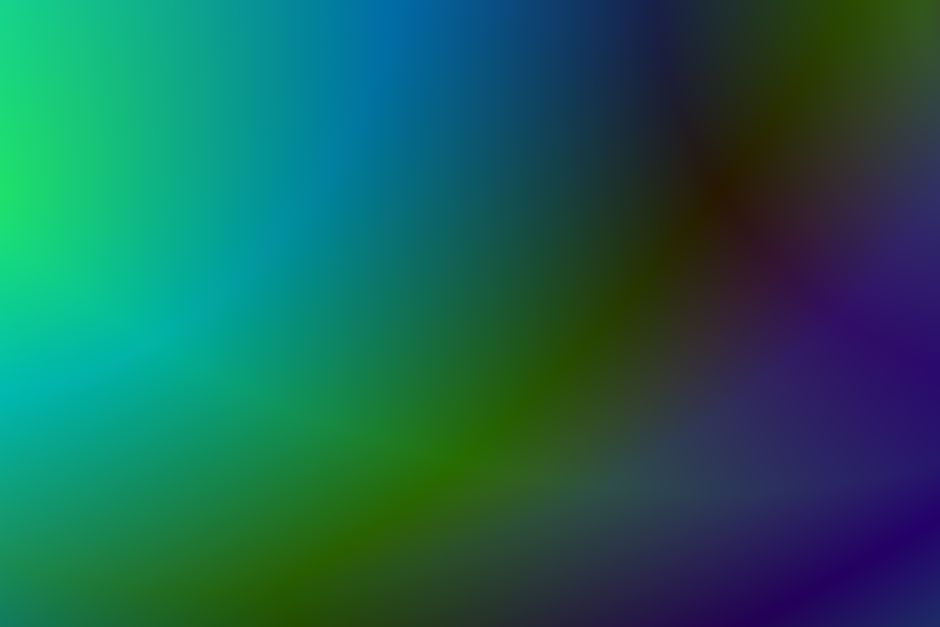 Una mezcla suave de tonos verdes, azules y púrpuras creando un efecto de gradiente abstracto.
