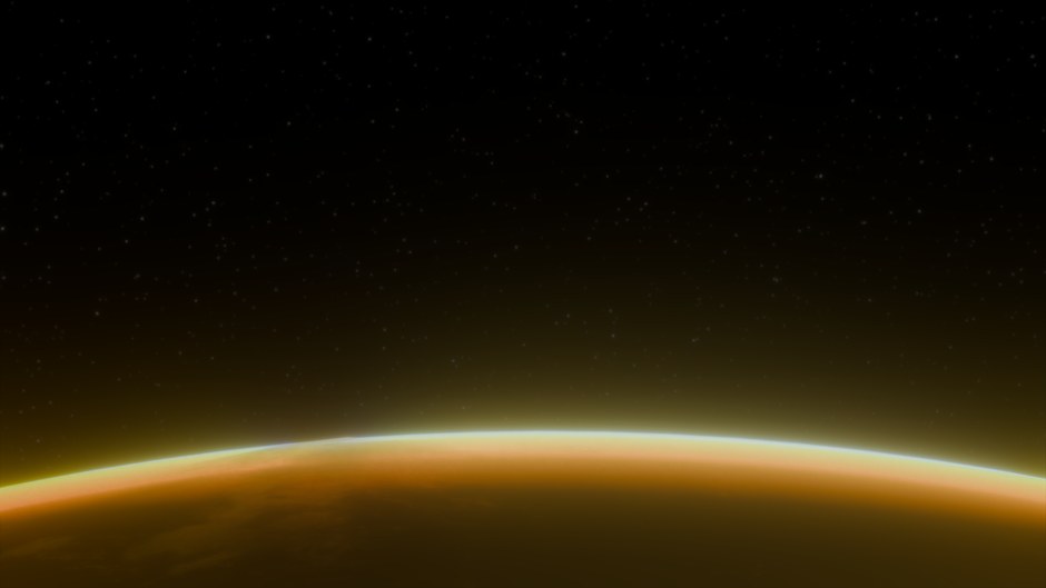 Impresionante imagen de la Tierra desde el espacio al amanecer, resaltando su curvatura y atmósfera.
