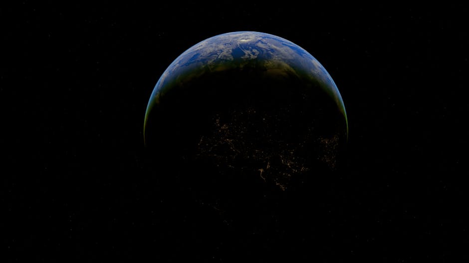 La Tierra semiiluminada desde el espacio muestra un hermoso contraste de azul y verde.